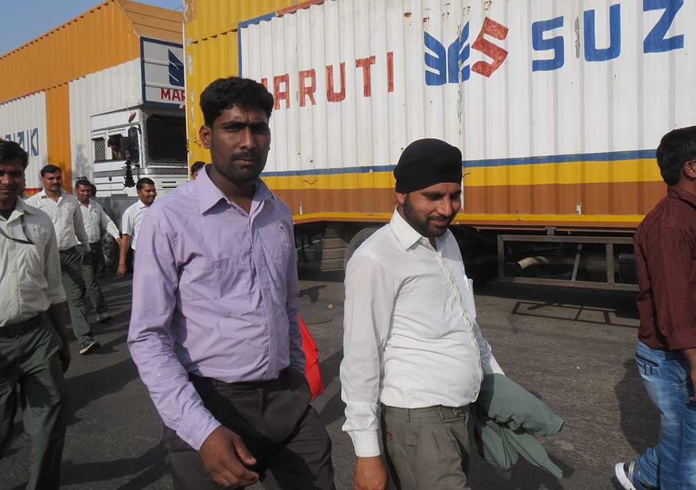 Permanent and contract workers of Maruti Suzuki India Limited march to show solidarity with their convicted former colleagues. Permanent and contract workers of Maruti Suzuki India Limited march to show solidarity with their convicted former colleagues.