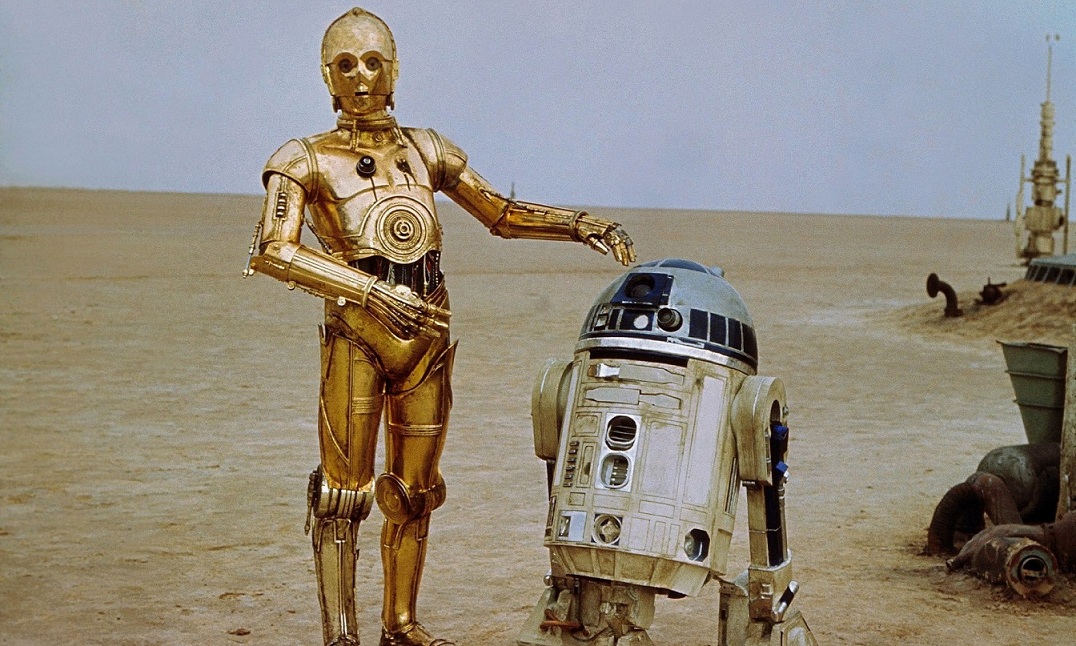 R2-D2 and C-3PO (played by Anthony Daniels). R2-D2 and C-3PO (played by Anthony Daniels).