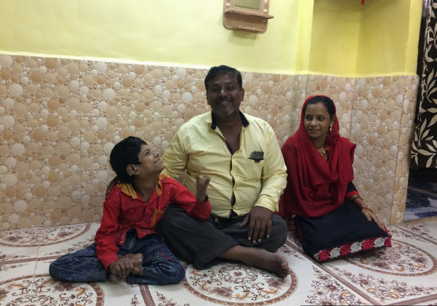 Javed Shaikh with his parents Samsunisa and Abdul Rahman in their new home. Javed’s family had to move to Mumbra in Thane district after their slum in Sewri was demolished. Javed no longer goes to school. (Photo credit: Swagata Yadavar/Indiaspend.com) Javed Shaikh with his parents Samsunisa and Abdul Rahman in their new home. Javed’s family had to move to Mumbra in Thane district after their slum in Sewri was demolished. Javed no longer goes to school. (Photo credit: Swagata Yadavar/Indiaspend.com)