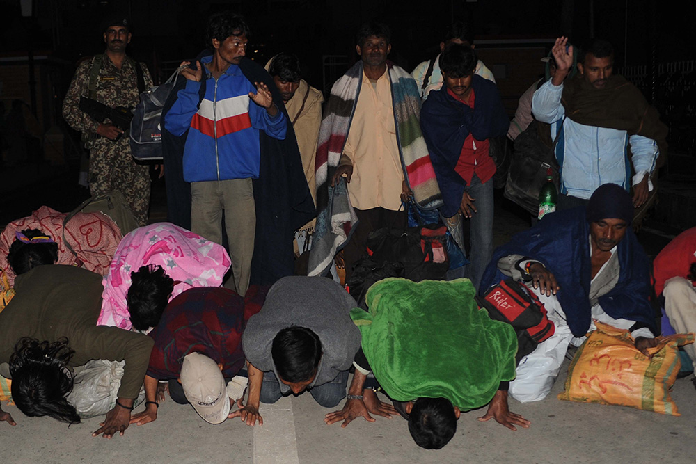 Indian fishermen released from imprisonment by Pakistani authorities return to Indian soil on January 8, 2012. Credit: Narinder Nanu/AFP Indian fishermen released from imprisonment by Pakistani authorities return to Indian soil on January 8, 2012. Credit: Narinder Nanu/AFP
