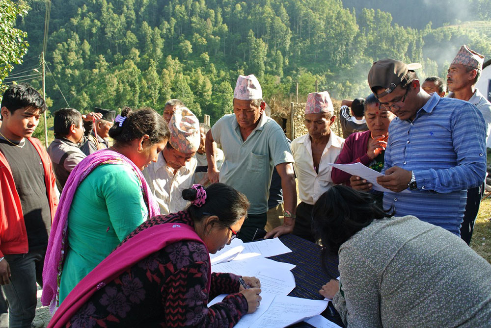 Residents of nearby villages complete the community-based survey. Photo credit: International Accountability Project Residents of nearby villages complete the community-based survey. Photo credit: International Accountability Project