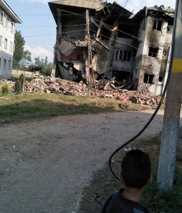 The damaged buildings at the District Police Lines. The damaged buildings at the District Police Lines.