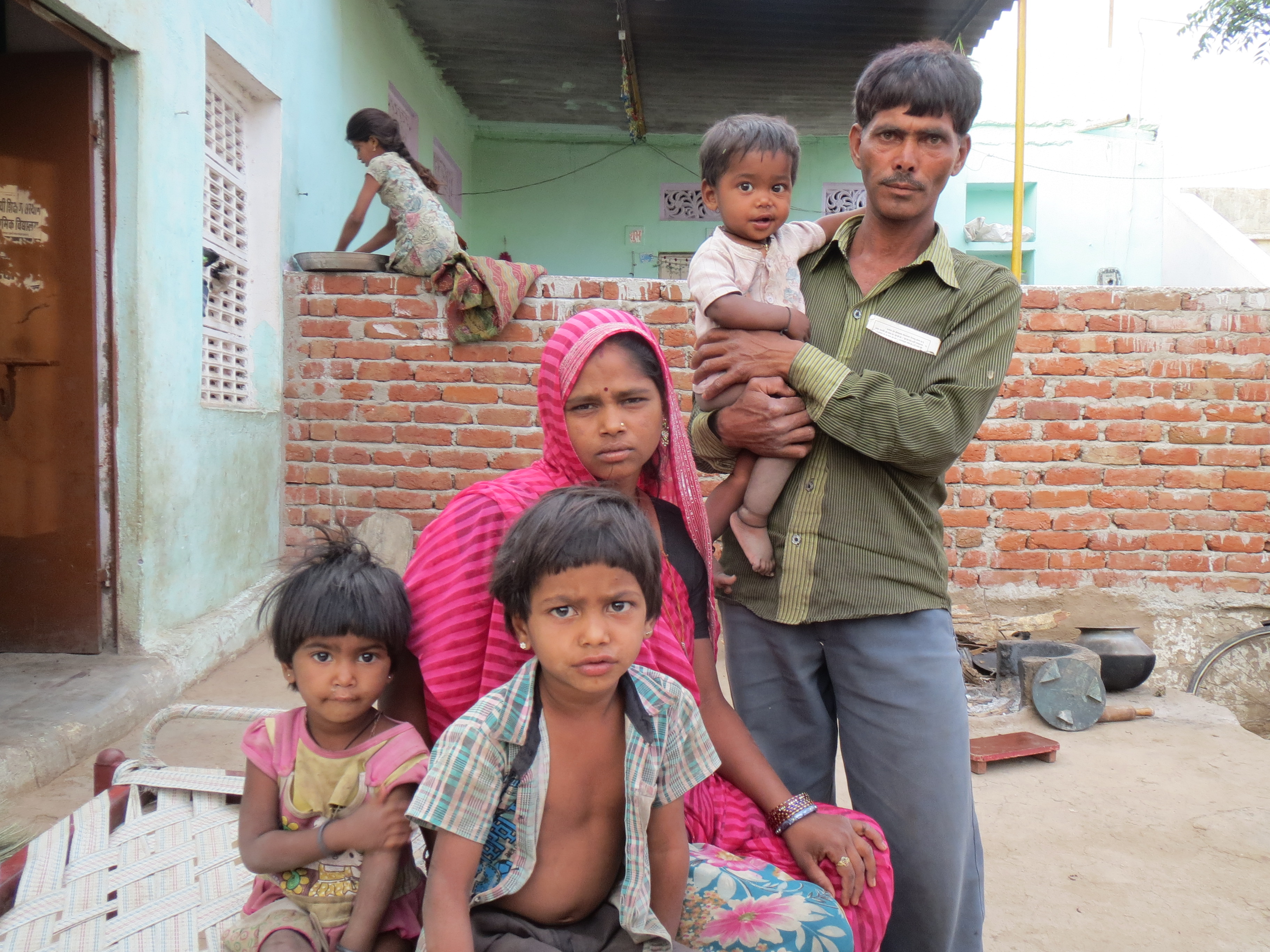 Babu Singh, a construction worker, and his polio-struck wife Punni Devi with their children in Jawaja, Rajasthan. The family has not received food rations after glitches in Aadhaar biometric authentication. Image credit: Anumeha Yadav Babu Singh, a construction worker, and his polio-struck wife Punni Devi with their children in Jawaja, Rajasthan. The family has not received food rations after glitches in Aadhaar biometric authentication. Image credit: Anumeha Yadav