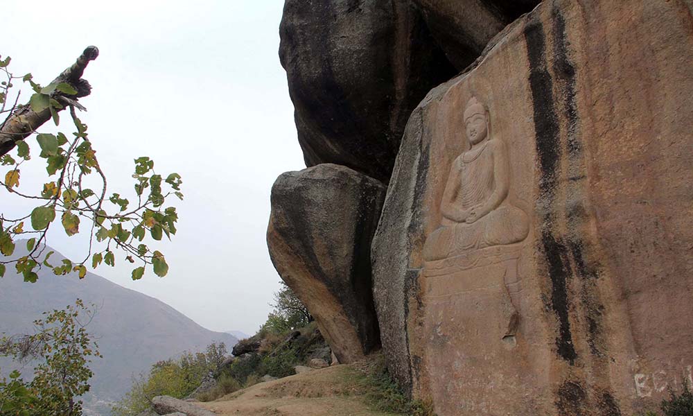 The defacement of the Buddha had sparked worldwide anger and concern. The defacement of the Buddha had sparked worldwide anger and concern.