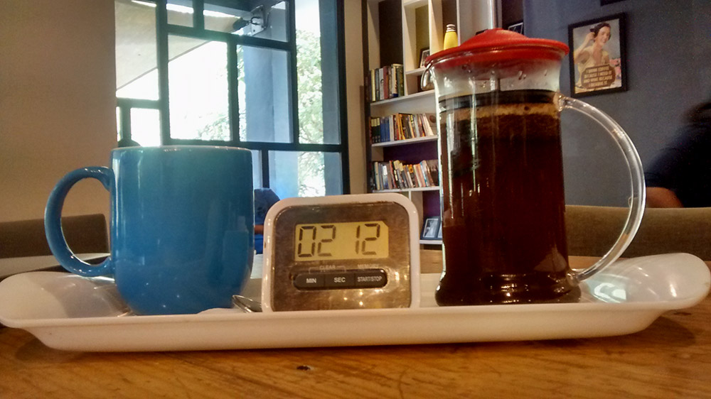 The French press is served with a timer. The French press is served with a timer.
