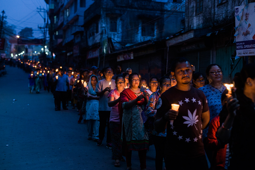 A candle-light march held on Sunday to mark the death of three activists who were allegedly killed in police firing on June 17. A candle-light march held on Sunday to mark the death of three activists who were allegedly killed in police firing on June 17.