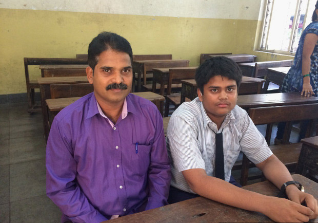 Deepak Khedekar with his son, Sahil, who suffers from hearing impairment and studies in Class 8 at the Baradevi Municipal School in Sewri, Mumbai. (Photo credit: Swagata Yadavar/Indiaspend.com) Deepak Khedekar with his son, Sahil, who suffers from hearing impairment and studies in Class 8 at the Baradevi Municipal School in Sewri, Mumbai. (Photo credit: Swagata Yadavar/Indiaspend.com)