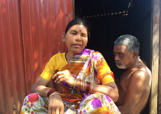 Asha, 40, and her husband Manohar Waghmare, 60, at heir house in Vangani. Manohar has had paralysis in his legs since the age of two, and both he and Asha are visually impaired. The couple have no source of income and their neighbours take care of them. ( Photo credit: Swagata Yadavar/Indiaspend.com) Asha, 40, and her husband Manohar Waghmare, 60, at heir house in Vangani. Manohar has had paralysis in his legs since the age of two, and both he and Asha are visually impaired. The couple have no source of income and their neighbours take care of them. ( Photo credit: Swagata Yadavar/Indiaspend.com)