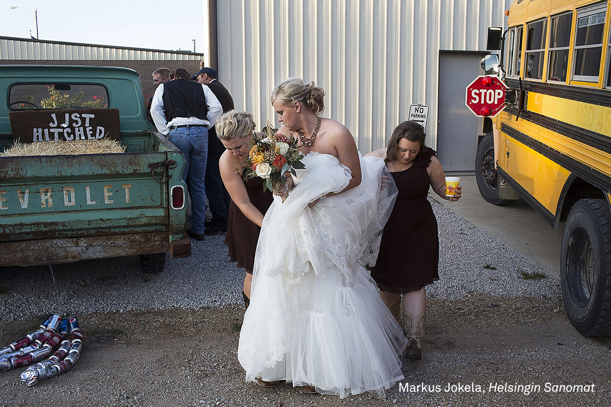 Long-Term Projects, third prize | Table Rock, Nebraska: Kelly Freeman arrives at her wedding reception in Dubois, Kansas, October 2013. (Markus Jokela for Helsingin Sanomat) Long-Term Projects, third prize | Table Rock, Nebraska: Kelly Freeman arrives at her wedding reception in Dubois, Kansas, October 2013. (Markus Jokela for Helsingin Sanomat)