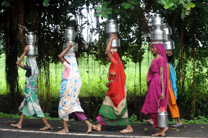 Women carry drinking water at Tilakwada village at Kevadia Colony in Narmada district of Gujarat. (Photo credit: AFP/Sam Panthaky). Women carry drinking water at Tilakwada village at Kevadia Colony in Narmada district of Gujarat. (Photo credit: AFP/Sam Panthaky).