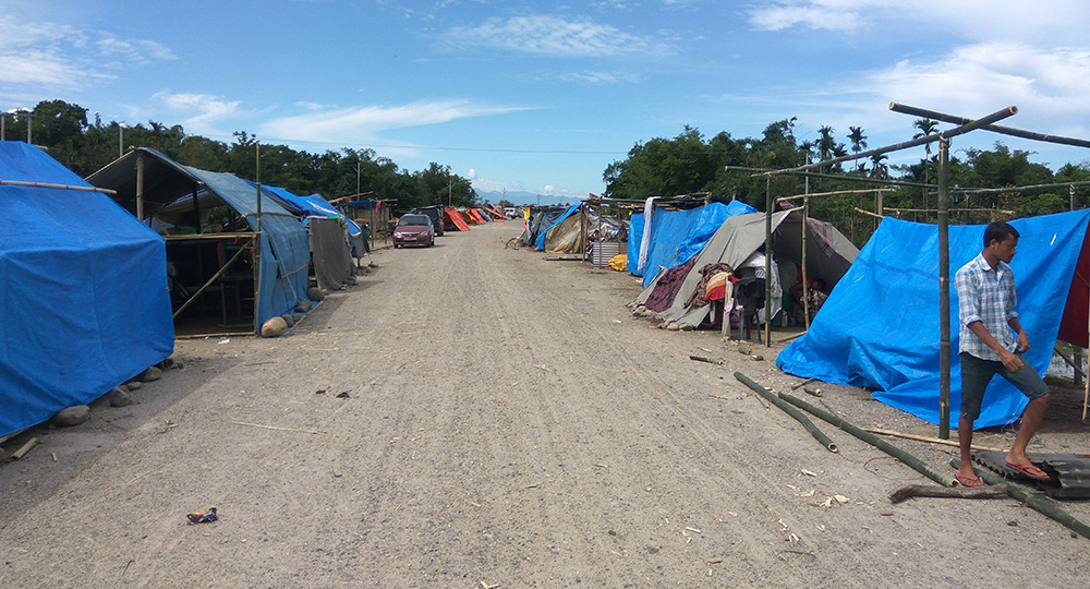 Relief camps at an under-contraction by-pass road connecting Lakhimpur town with the soon-to-be-completed Bogibeel bridge. Relief camps at an under-contraction by-pass road connecting Lakhimpur town with the soon-to-be-completed Bogibeel bridge.