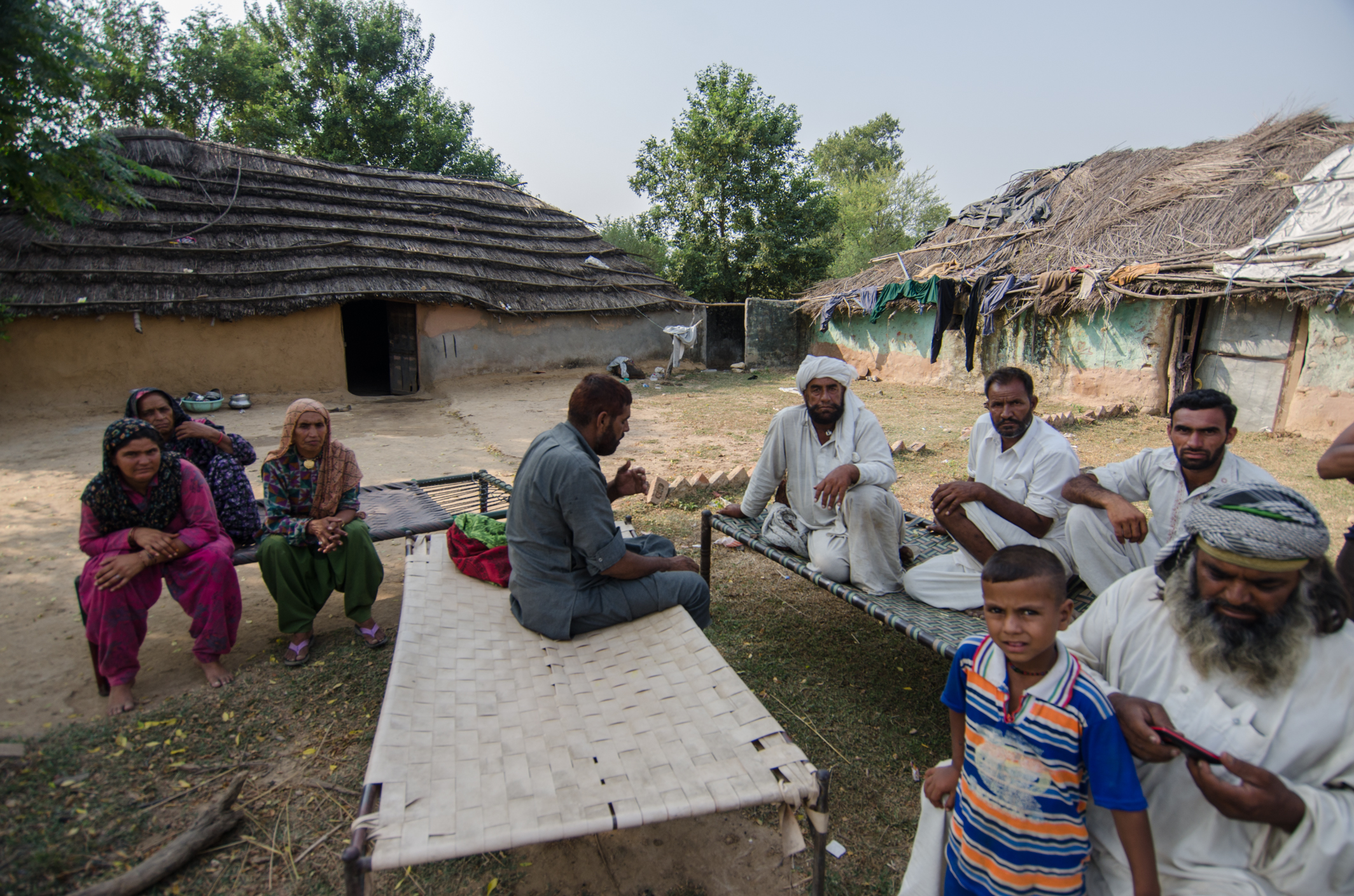 Neighbours gathered at Reham Ali's kula. Photo: Rayan Naqash Neighbours gathered at Reham Ali's kula. Photo: Rayan Naqash