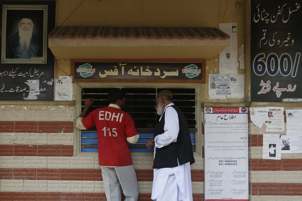 A portrait of Abdul Sattar Edhi seen at the reception window at the Edhi Foundation morgue. (Photo: Akthar Soomro/Reuters) A portrait of Abdul Sattar Edhi seen at the reception window at the Edhi Foundation morgue. (Photo: Akthar Soomro/Reuters)