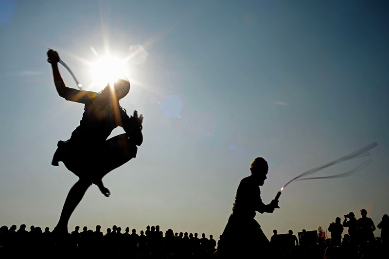 A performance of gatka, a martial art that is considered to be a spiritual exercise, in addition to a physical one. A performance of gatka, a martial art that is considered to be a spiritual exercise, in addition to a physical one.