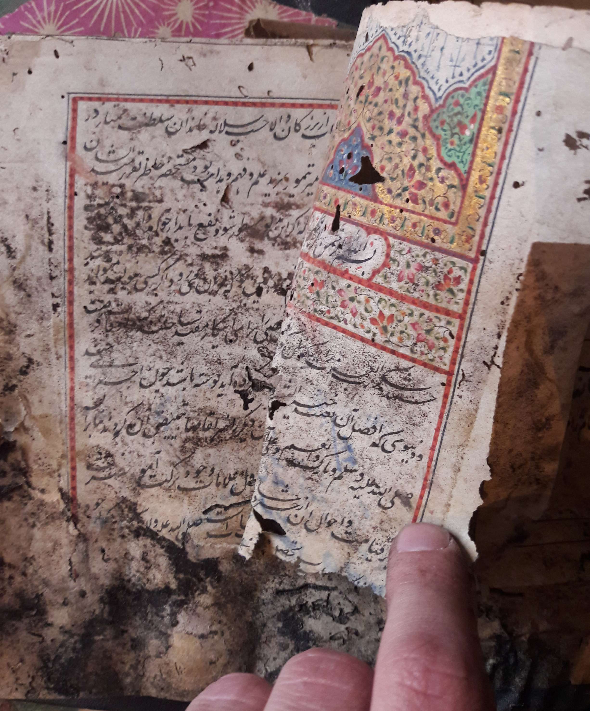 A water-damaged Persian manuscript A water-damaged Persian manuscript