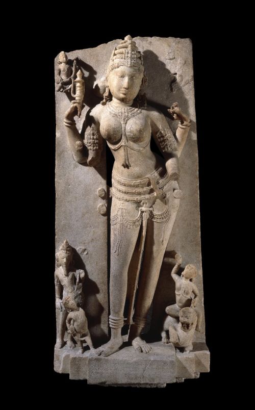 Photo Courtesy: British Museum. Standing figure of the Jaina yaksini Ambika carved in a coarse white marble. Photo Courtesy: British Museum. Standing figure of the Jaina yaksini Ambika carved in a coarse white marble.