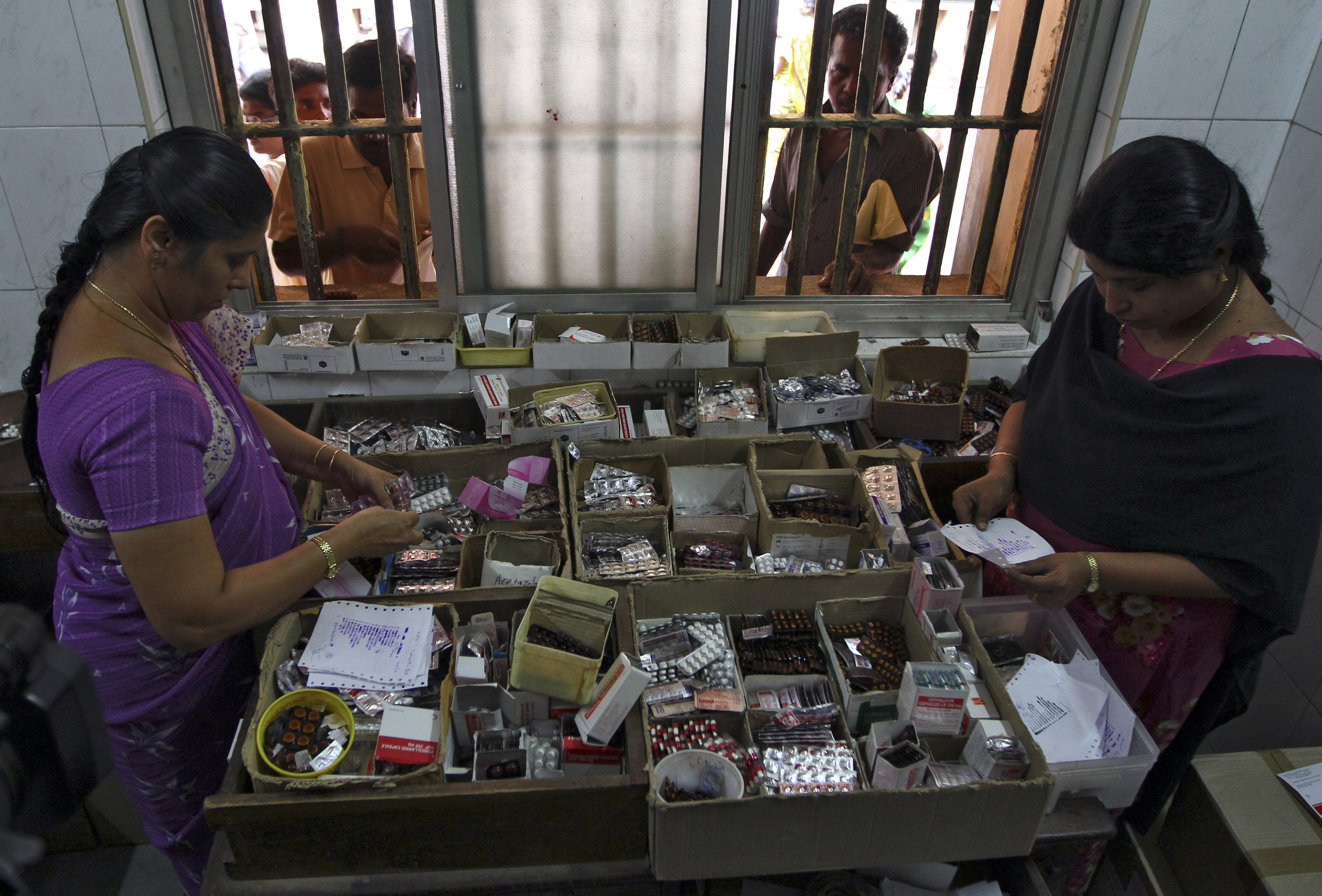 Pharmacists dispense free medication in a Tamil Nadu hospital. Credit: Babu Babu/Reuters Pharmacists dispense free medication in a Tamil Nadu hospital. Credit: Babu Babu/Reuters