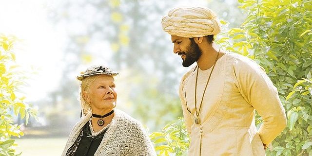 Judi Dench and Ali Fazal in Victoria and Abdul. Courtesy Working Title. Judi Dench and Ali Fazal in Victoria and Abdul. Courtesy Working Title.
