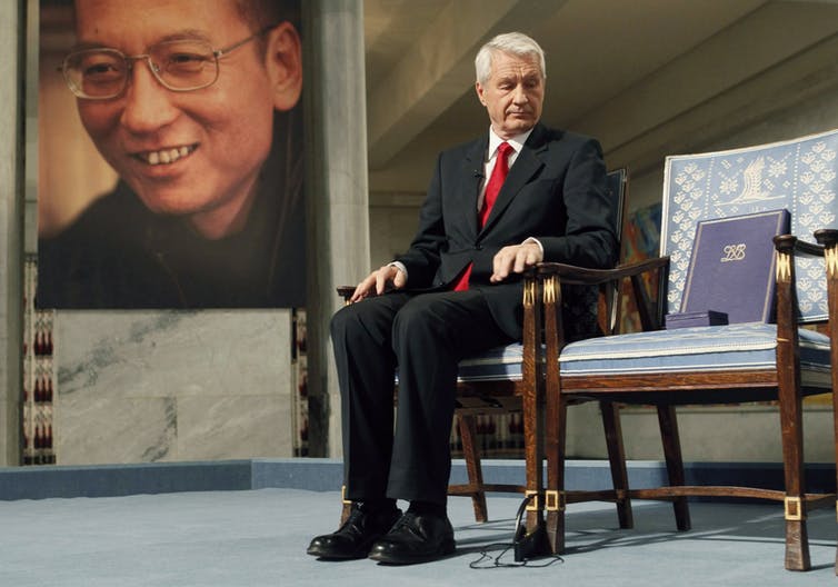 Portrait of Nobel Peace Prize winner jailed Chinese dissident Liu Xiaobo in the background, during the ceremony in 2010. Photo credit: Norsk Telegrambyra AS/Reuters Portrait of Nobel Peace Prize winner jailed Chinese dissident Liu Xiaobo in the background, during the ceremony in 2010. Photo credit: Norsk Telegrambyra AS/Reuters
