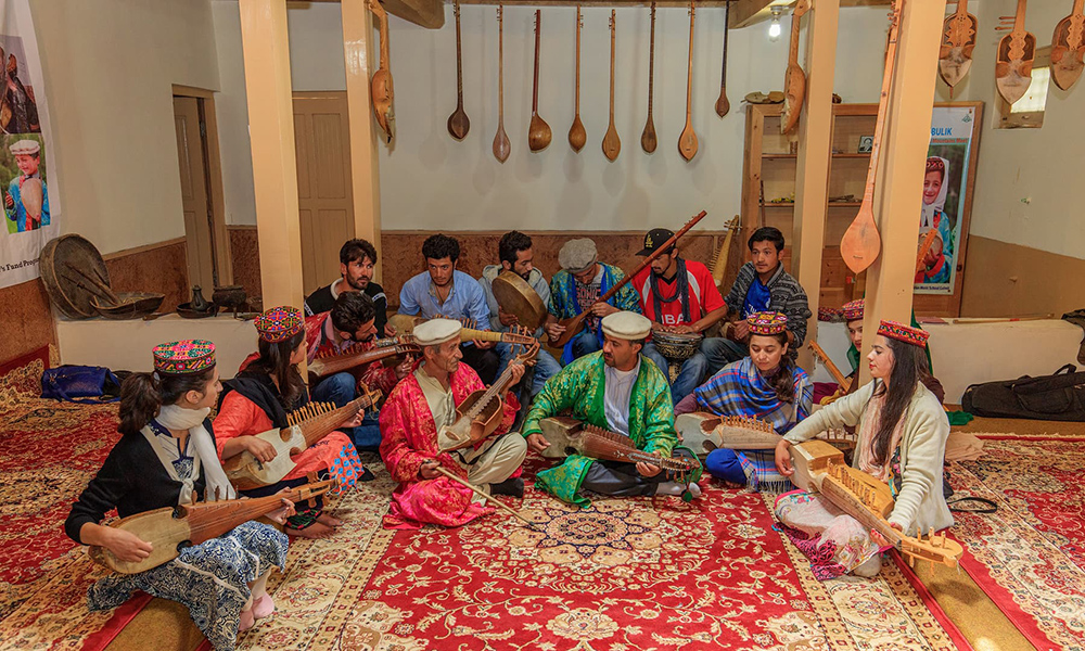 Students practice their instruments with their teachers. Students practice their instruments with their teachers.
