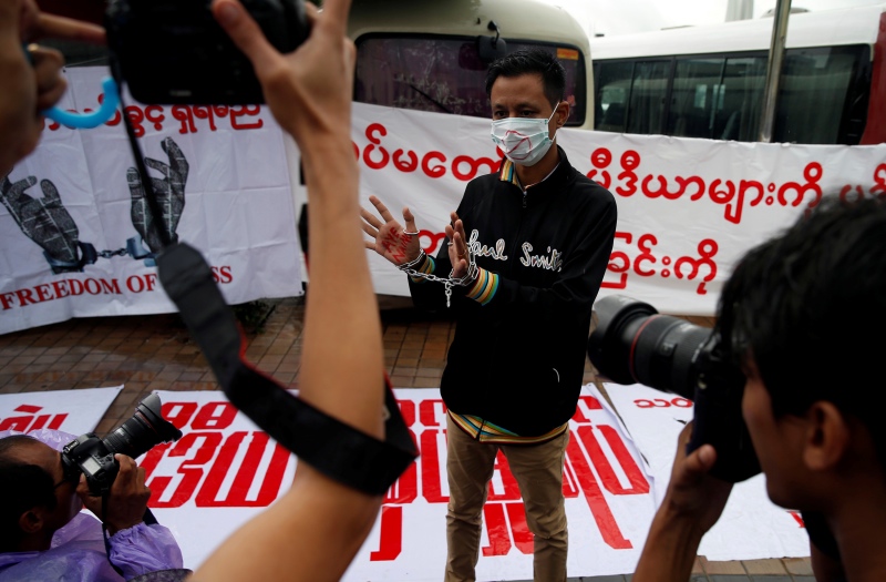 A Burmese reporter protests against the detention of reporters in Myanmar, on June 30. Photo credit: Soe Zeya Tun/Reuters A Burmese reporter protests against the detention of reporters in Myanmar, on June 30. Photo credit: Soe Zeya Tun/Reuters