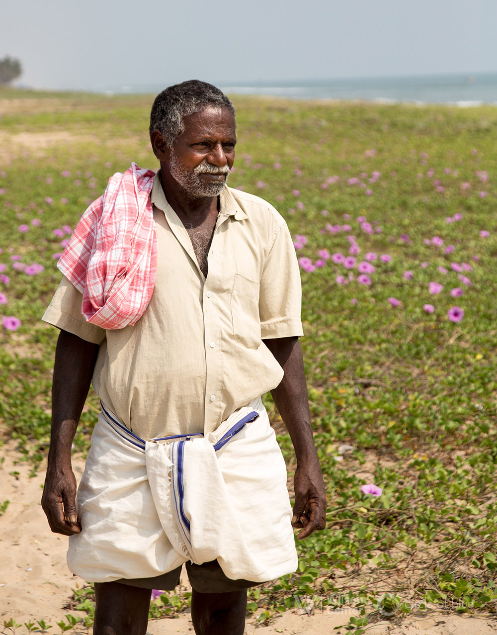 Harikrishna was 54 years old in 2009 when he learned of the Cheyyur project. A friend told him government surveyors were in the community to interview landowners. “We were worried. We didn’t know what they wanted,” he said. “I went to the first meeting. I found out they wanted to take all the land here.” Photograph by Dhruv Malhotra © Wilson Center/Circle of Blue Harikrishna was 54 years old in 2009 when he learned of the Cheyyur project. A friend told him government surveyors were in the community to interview landowners. “We were worried. We didn’t know what they wanted,” he said. “I went to the first meeting. I found out they wanted to take all the land here.” Photograph by Dhruv Malhotra © Wilson Center/Circle of Blue