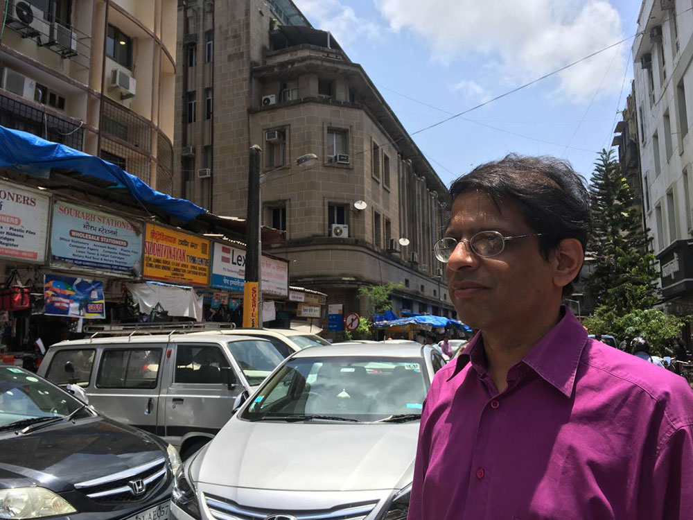 Arun Dohle, co-founder of Against Child Trafficking that has helped reunite inter-country adoptees with their birth mothers, poses for a picture on a busy street in Mumbai, India on June 16, 2017. Photo credit: Roli Srivastava/Thomson Reuters Foundation Arun Dohle, co-founder of Against Child Trafficking that has helped reunite inter-country adoptees with their birth mothers, poses for a picture on a busy street in Mumbai, India on June 16, 2017. Photo credit: Roli Srivastava/Thomson Reuters Foundation