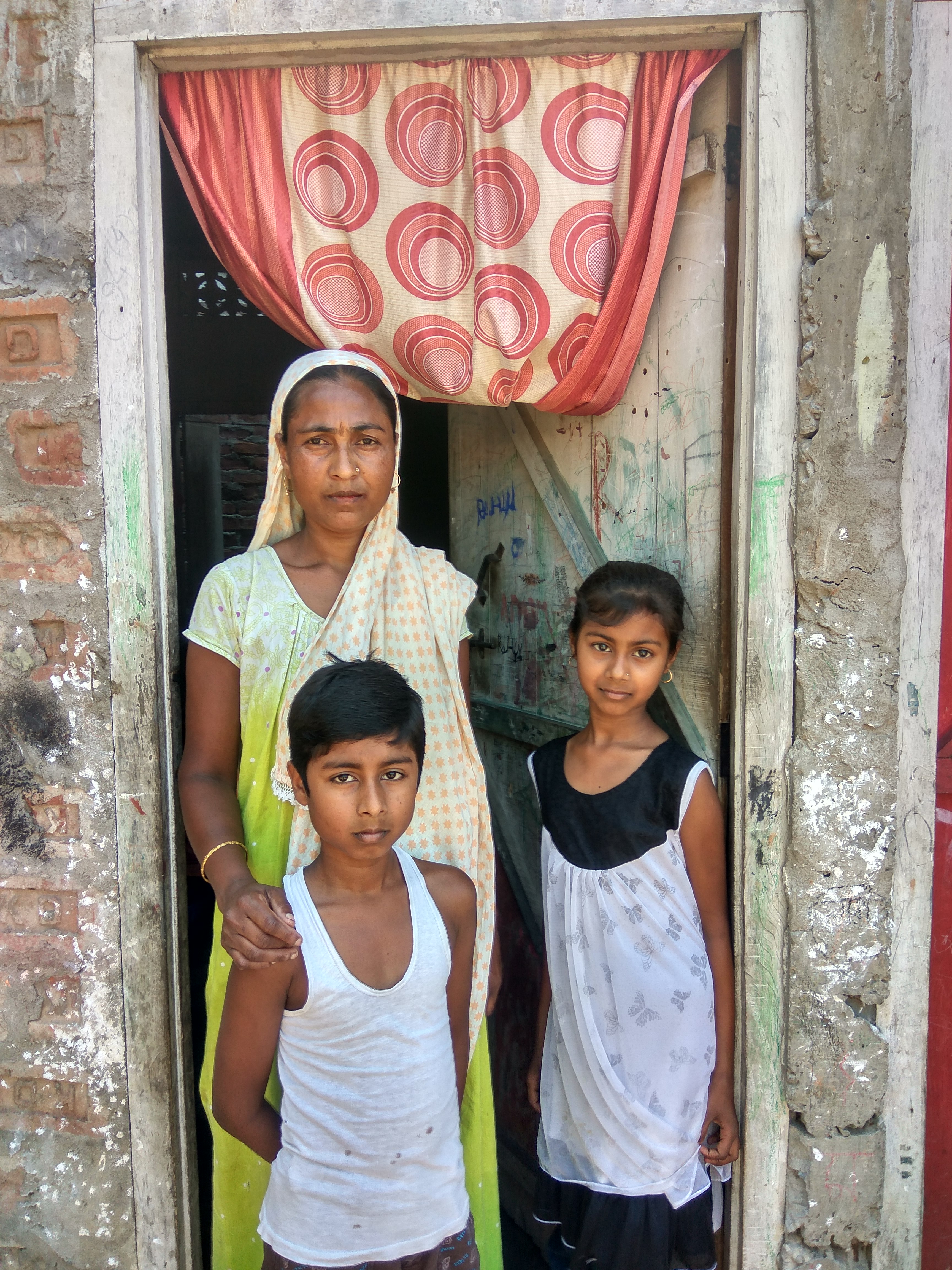 Sehra Begum with her children. Sehra Begum with her children.