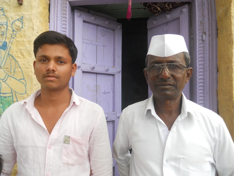 Retired Maratha school teacher Popatshankar Bhute (right) with Maratha youth Nitin Bhakre in Kharda village in Ahmednagar district. (Photo credit: Rahi Gaikwad). Retired Maratha school teacher Popatshankar Bhute (right) with Maratha youth Nitin Bhakre in Kharda village in Ahmednagar district. (Photo credit: Rahi Gaikwad).