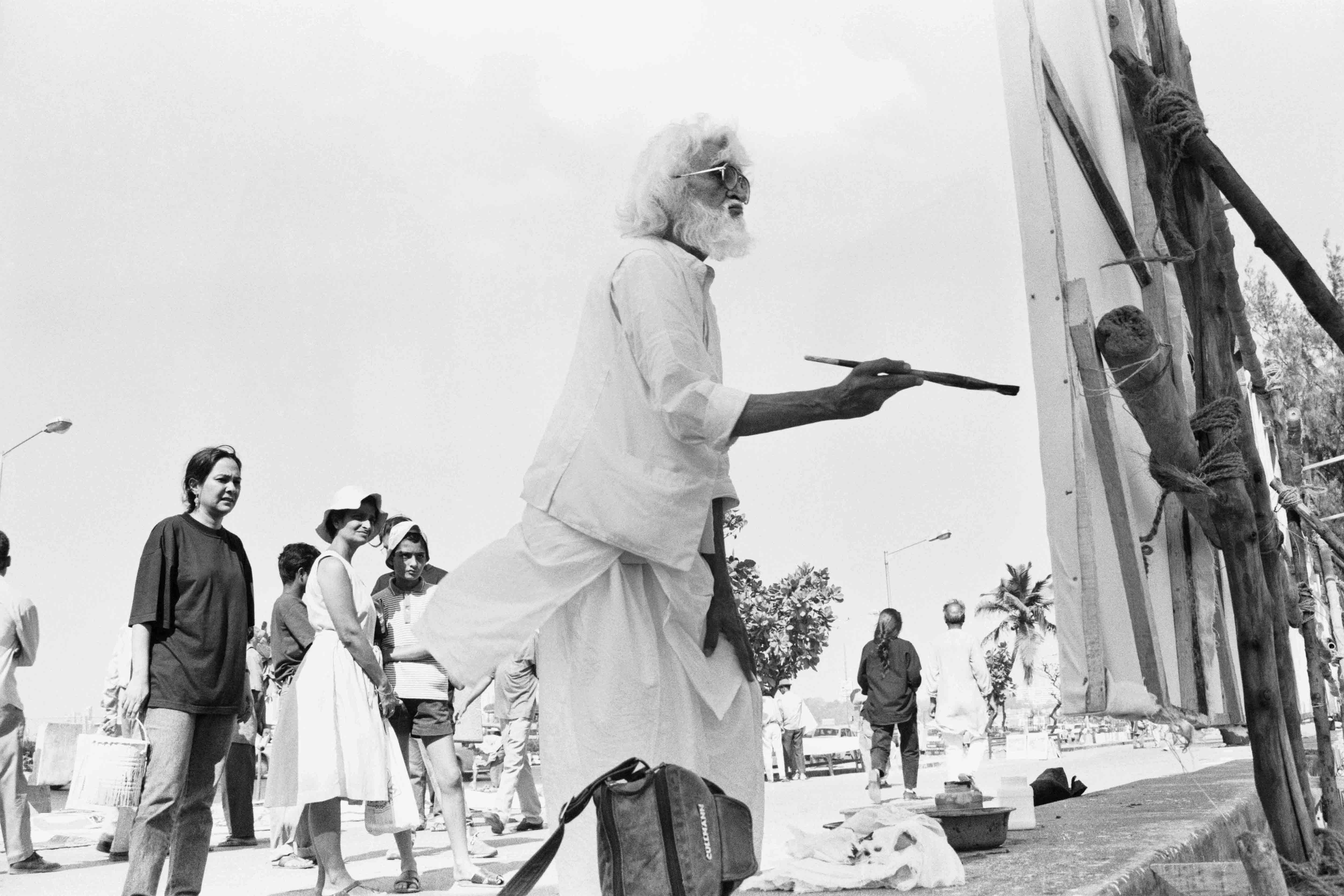 MF Husain painting a hoarding. Image courtesy: Parthiv Shah. MF Husain painting a hoarding. Image courtesy: Parthiv Shah.