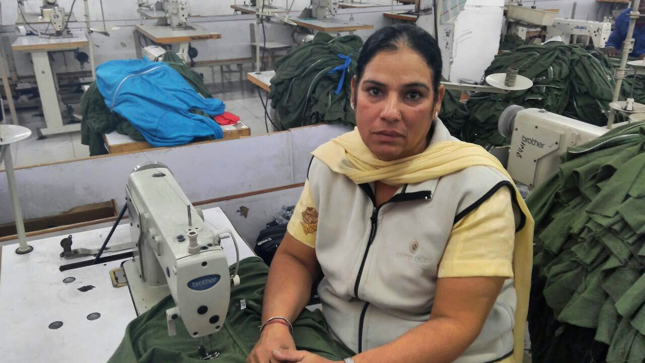 Harminder Kaur, a garment worker, lost three days of work standing outside banks to exchange notes. Harminder Kaur, a garment worker, lost three days of work standing outside banks to exchange notes.