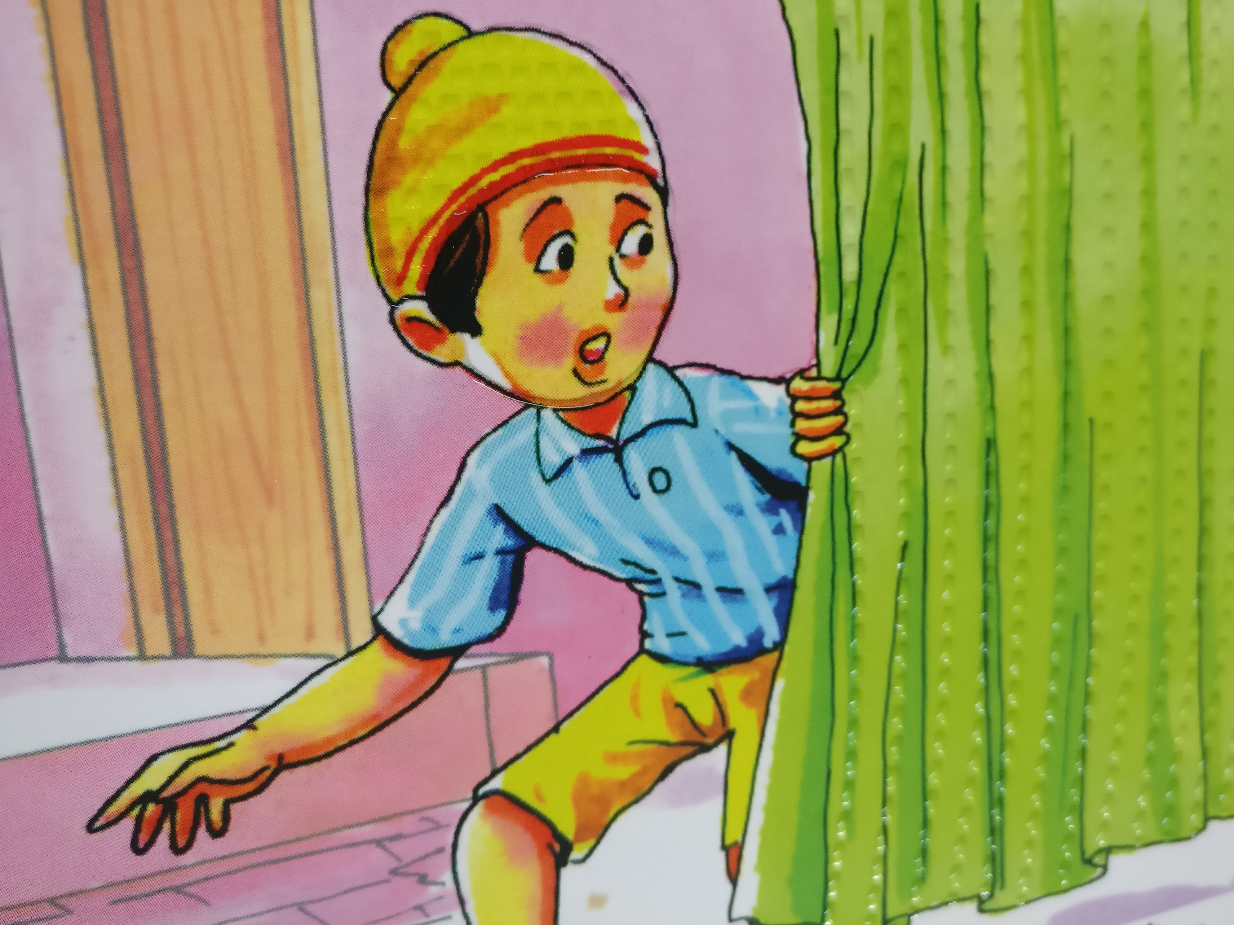 Even illustrations of objects such as cupboards and trees have tactile textures of their own. The curtain in this one has columns of dots. (Photo credit: Richa Shrivastava). Even illustrations of objects such as cupboards and trees have tactile textures of their own. The curtain in this one has columns of dots. (Photo credit: Richa Shrivastava).