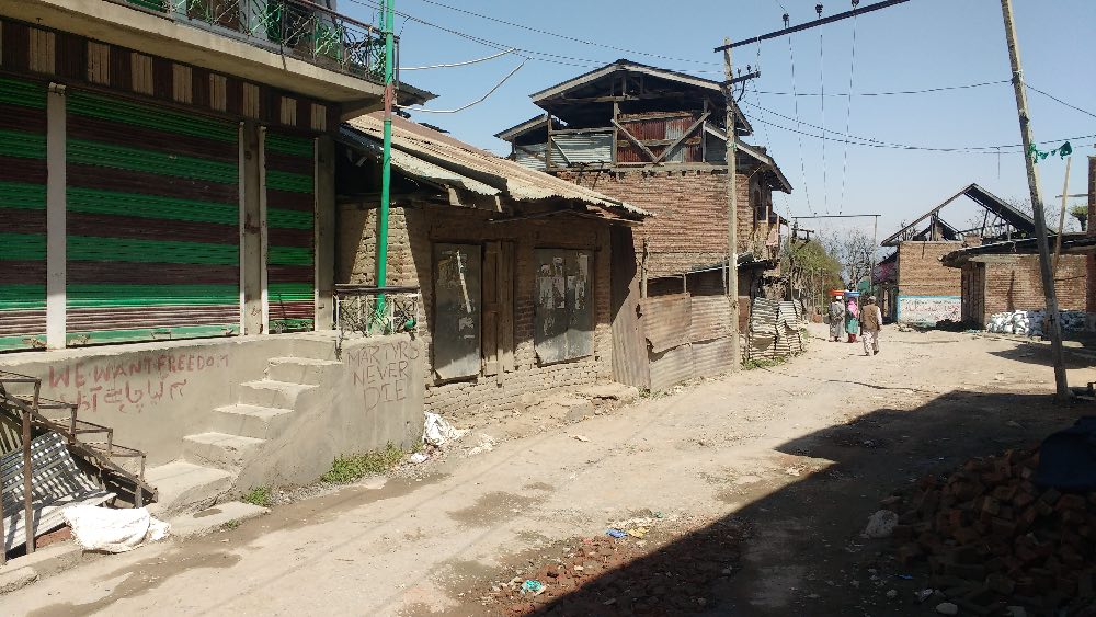 A deserted village, with pro-freedom slogans. Image credit: Rayan Naqash A deserted village, with pro-freedom slogans. Image credit: Rayan Naqash