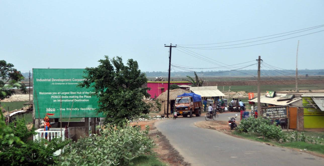 A hoarding marking the entry point to the project site at Balitutha. It announces the state-run Industrial Infrastructure Development Corporation as the "friendly facilitator" of the project. A hoarding marking the entry point to the project site at Balitutha. It announces the state-run Industrial Infrastructure Development Corporation as the "friendly facilitator" of the project.