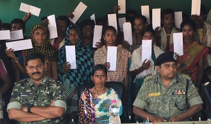 As the sarpanch of Chintagufa, Muiye had to attend official events. Here, she is seated next to SRP Kulluri, the former Inspector General of the Bastar police, at a Maoist surrender ceremony in 2015. As the sarpanch of Chintagufa, Muiye had to attend official events. Here, she is seated next to SRP Kulluri, the former Inspector General of the Bastar police, at a Maoist surrender ceremony in 2015.