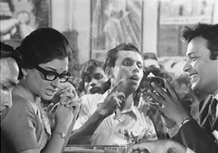 Aditi (Sharmila Tagore) prises open the lid that Arindam Mukherjee has shut on his real self Aditi (Sharmila Tagore) prises open the lid that Arindam Mukherjee has shut on his real self