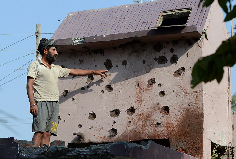Homes in the Gajansoo border village were damaged in cross-border firing in the Kanachak sector, about 25km from Jammu, on October 24. Credit: AFP Homes in the Gajansoo border village were damaged in cross-border firing in the Kanachak sector, about 25km from Jammu, on October 24. Credit: AFP