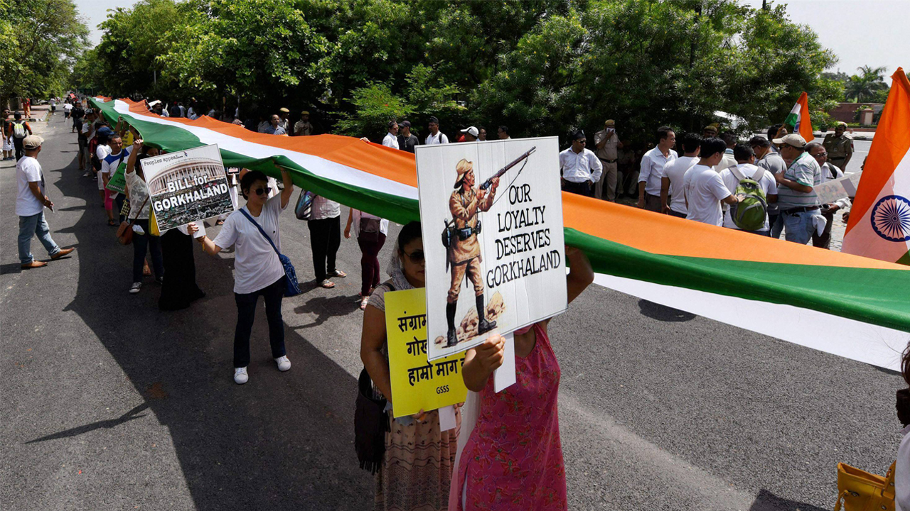 Gorkhaland supporters march with a 110-metre-long tricolour in Delhi on July 9. Gorkhaland supporters march with a 110-metre-long tricolour in Delhi on July 9.