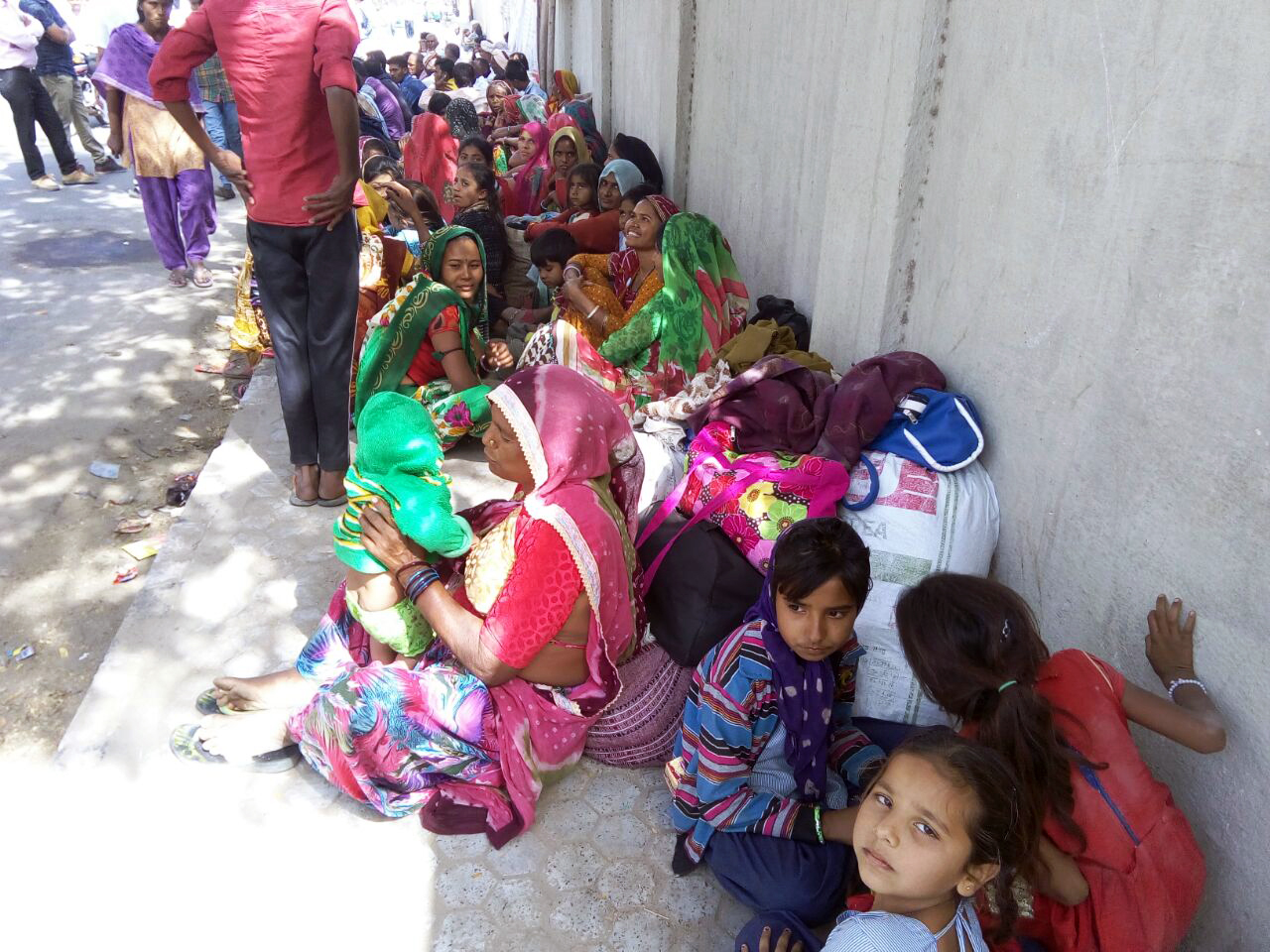 Dalit residents of Par village protest on the footpath in front of the Patan collectorate. Dalit residents of Par village protest on the footpath in front of the Patan collectorate.