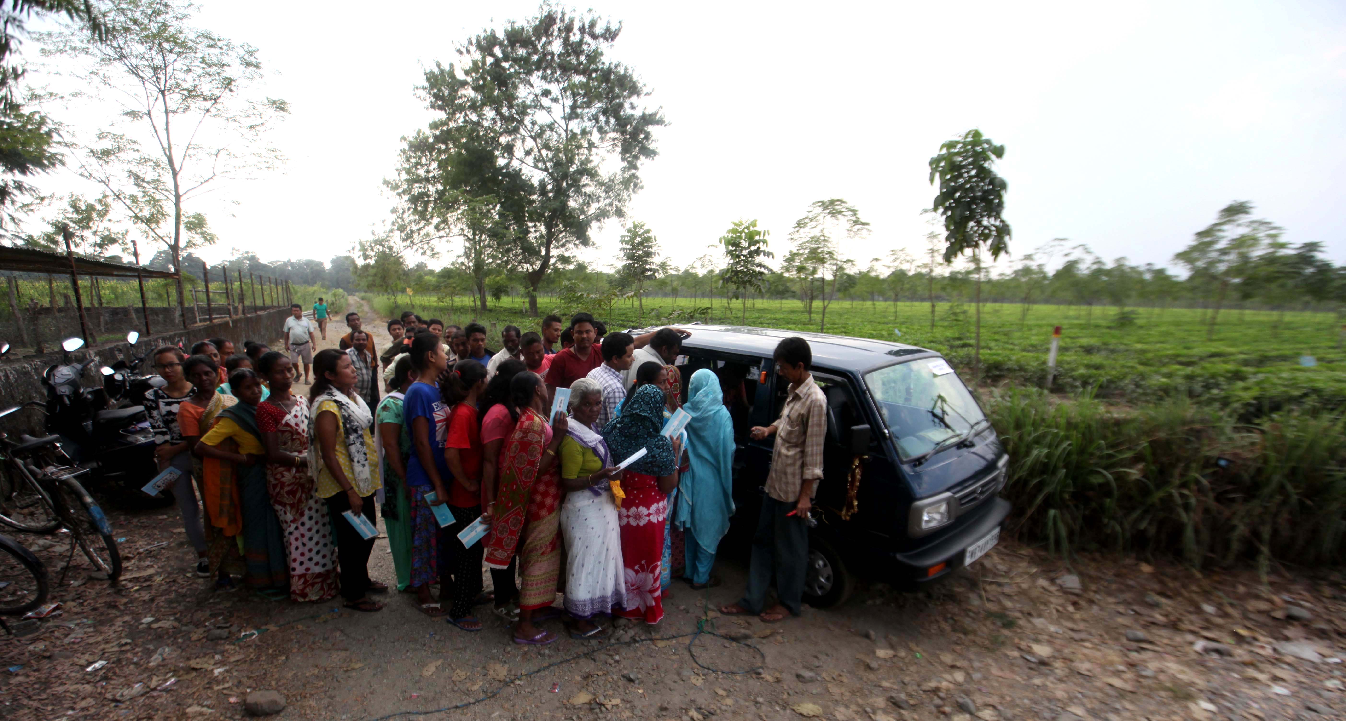 A cash van distributes money to tea workers. A cash van distributes money to tea workers.