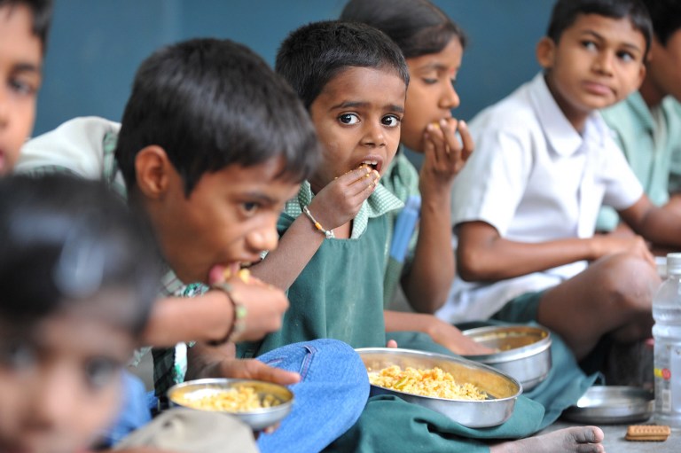 Around 60 lakh women work as anganwadi workers, social health activists and mid-day meal workers in India. (Credit: Noah Seelam / AFP) Around 60 lakh women work as anganwadi workers, social health activists and mid-day meal workers in India. (Credit: Noah Seelam / AFP)
