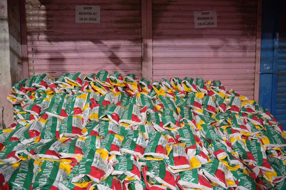 A thousand sacks of rice stand ready to be distributed. A thousand sacks of rice stand ready to be distributed.