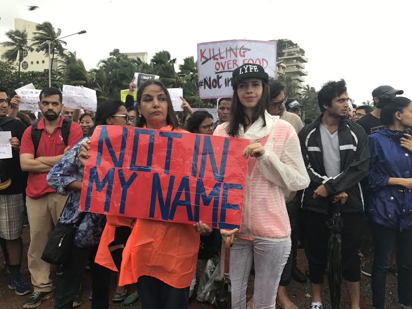 Actors Shabana Azmi and Kalki Koechlin hold up a Actors Shabana Azmi and Kalki Koechlin hold up a