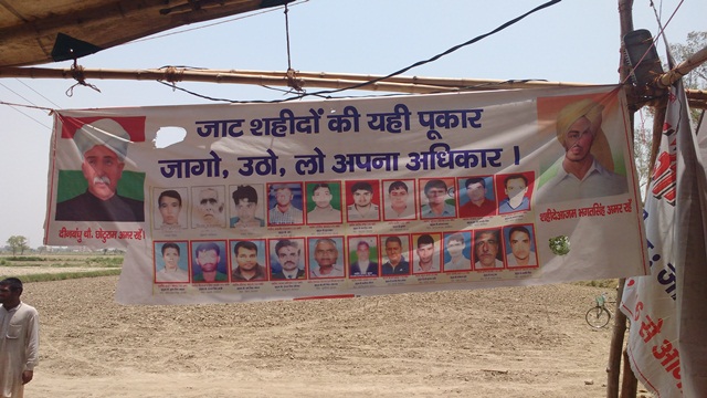 A poster at Jasiya, Rohtak with photos of the Jats killed by the police in the February agitation along with Chhotu Ram and Bhagat Singh. A poster at Jasiya, Rohtak with photos of the Jats killed by the police in the February agitation along with Chhotu Ram and Bhagat Singh.