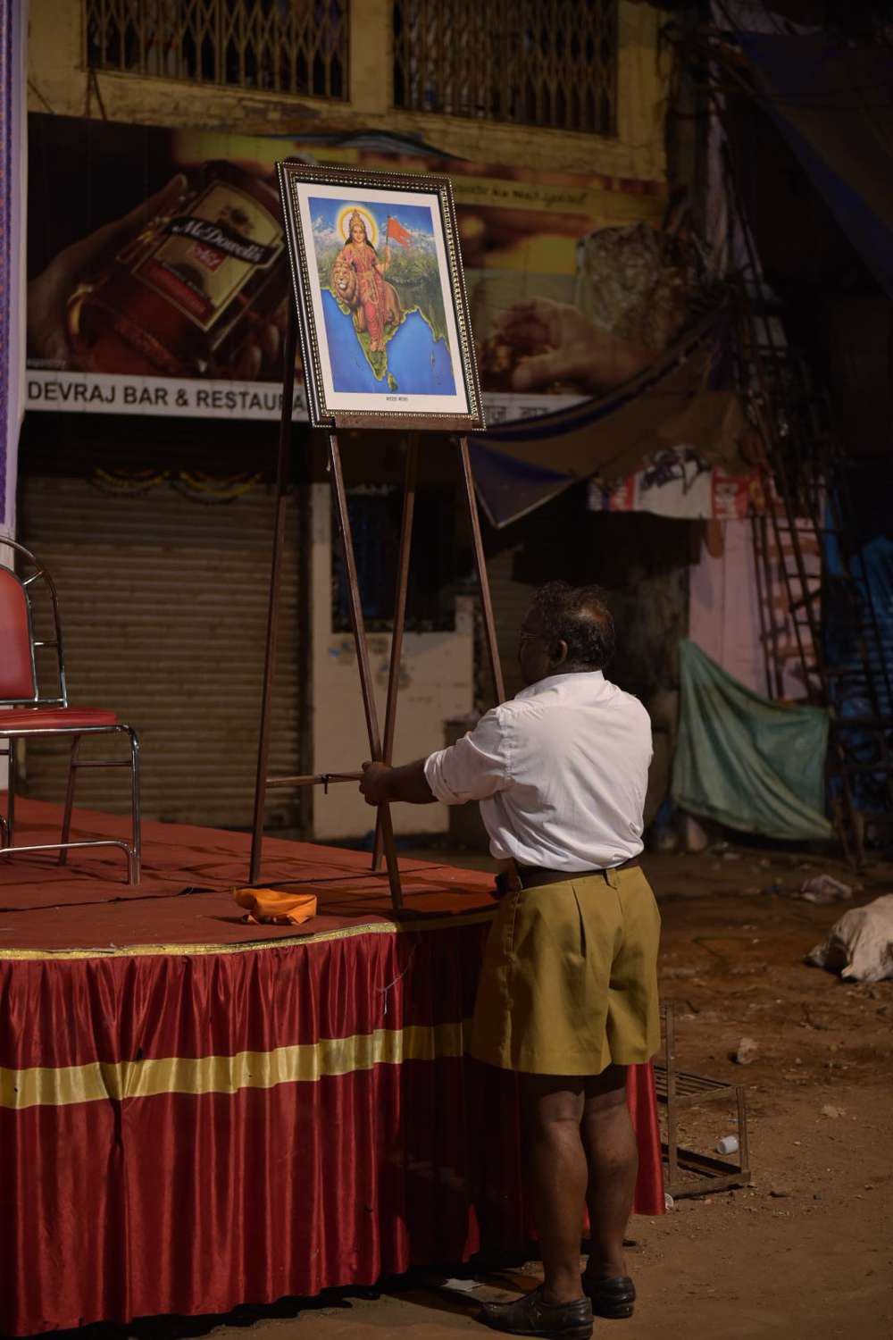 Ramakrishnan Nadar(47) a member of the local Rashtriya Swayamsevak Sangh unit, sets up stage. Ramakrishnan Nadar(47) a member of the local Rashtriya Swayamsevak Sangh unit, sets up stage.