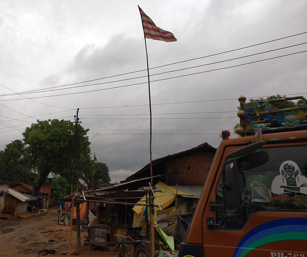The red-and-white flag of the Sarna religion, an animist faith followed by a large number of Adivasis in Jharkhand. The red-and-white flag of the Sarna religion, an animist faith followed by a large number of Adivasis in Jharkhand.