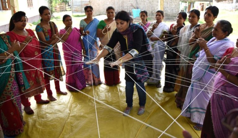 Purnima Barman educates village women through the web of life game. Image Credit: Aaranyak Purnima Barman educates village women through the web of life game. Image Credit: Aaranyak
