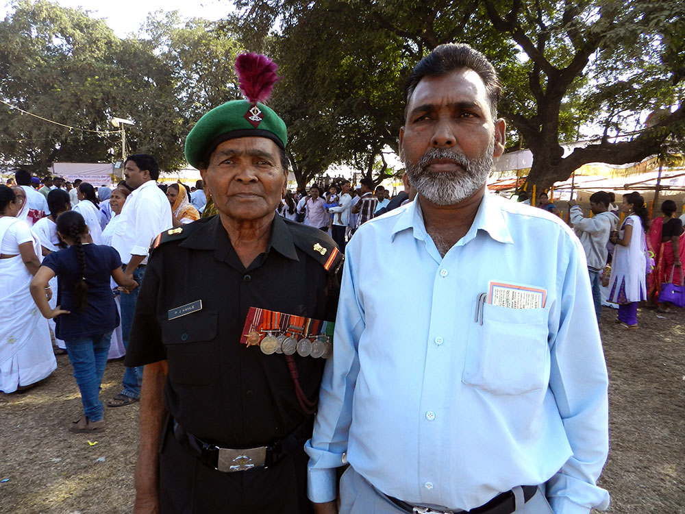 Subedar Major PJ Kamble (retired) of the Mahar Regiment visits the Bhima Koregaon victory pillar with his son. Credit: Mridula Chari Subedar Major PJ Kamble (retired) of the Mahar Regiment visits the Bhima Koregaon victory pillar with his son. Credit: Mridula Chari