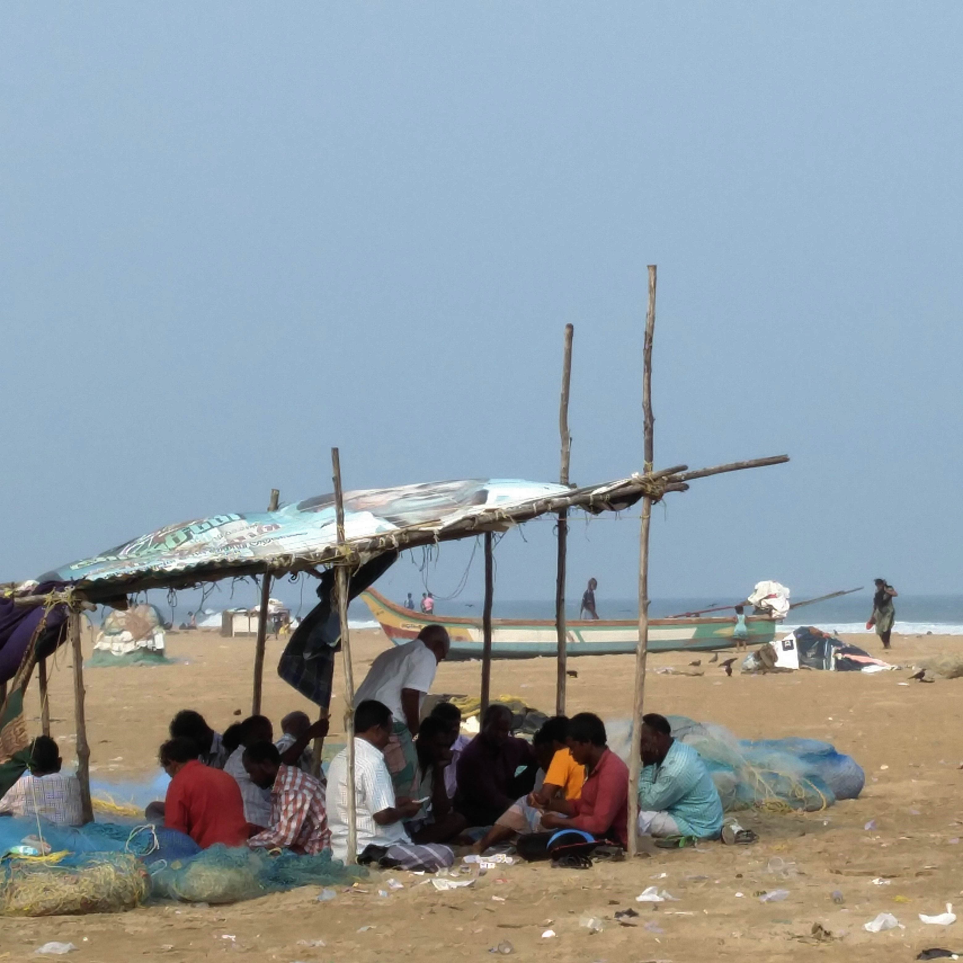 Fishermen play cards on Marina beach in Chennai. (Photo credit: Vinita Govindarajan). Fishermen play cards on Marina beach in Chennai. (Photo credit: Vinita Govindarajan).