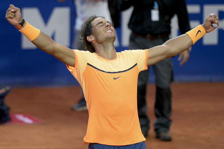 Rafael Nadal exults after winning the Barcelona Open and equalling Guillermo Vilas's record of 49 clay-court titles. Josep Lago/AFP Rafael Nadal exults after winning the Barcelona Open and equalling Guillermo Vilas's record of 49 clay-court titles. Josep Lago/AFP